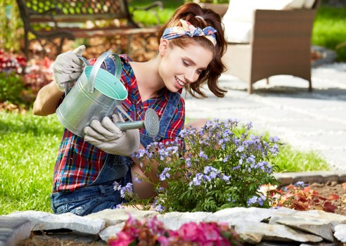 Professional gardener following health and safety procedures in a green space